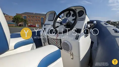 Avon 620 Adventure Rib: helm console with steering wheel, gauges and blue and white vinyl seating
