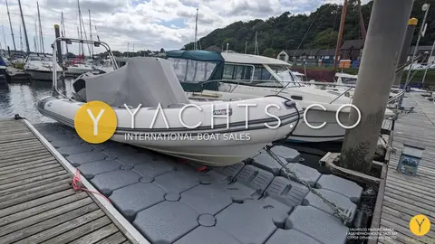 Avon Adventure 620 Rib & Trailer: rIB on the floating dock with console and seat covers fitted