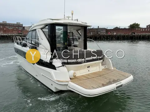 Bavaria S36: starboard quarter showing teak bathing platform and hardtop coupe superstructure