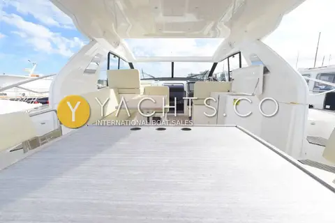 Bavaria Sport 400 HT: cockpit under the open hardtop, looking forward from the sunpad to the helm