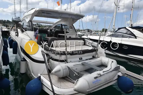 Bavaria SR41: stern from port quarter with tender on platform and outboard mounted on the rail