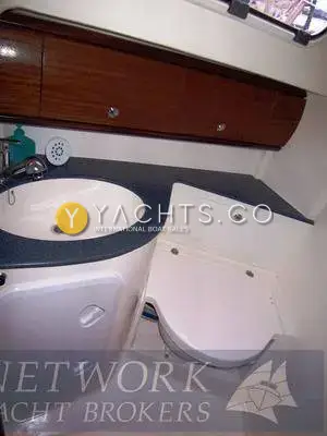 Bavaria Yachts Bavaria 36 Cruiser: heads compartment with moulded basin, dark worktop, wooden lockers and toilet