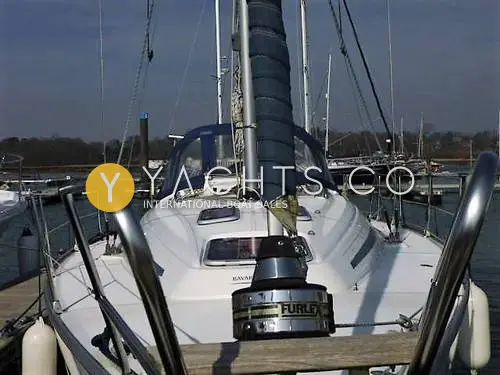Bavaria Yachts Bavaria 36 Cruiser: foredeck view aft from the bow, with furling drum, spray hood and marina setting