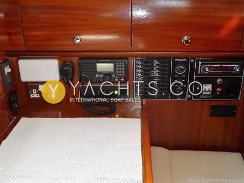 Bavaria Yachts Bavaria 36 Cruiser: chart table with VHF radio, switch panel, stereo and double socket