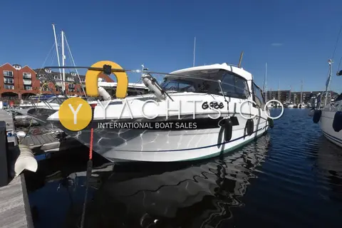 Beneteau Antares 8.80: bow quarter view alongside a pontoon with a lifebuoy on the rail