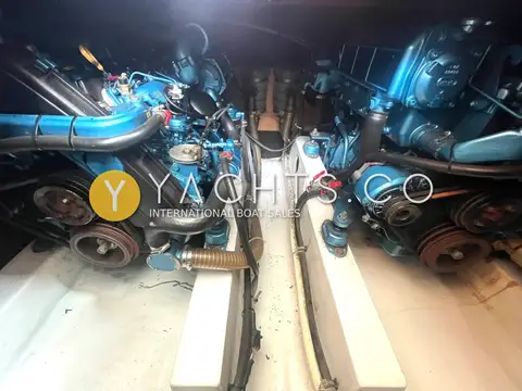 Beneteau Antares 980: engine bay showing two blue diesel engines side by side