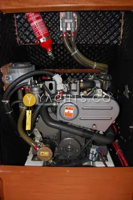 Beneteau Oceanis Clipper 343: engine bay showing the diesel engine, soundproofing and fire extinguisher