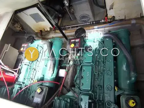 Birchwood Challenger 320: engine bay showing the twin green Volvo diesel engines side by side