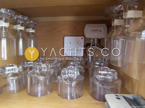 Birchwood Challenger 320: glassware locker with stemmed glasses and tumblers held in fitted racks