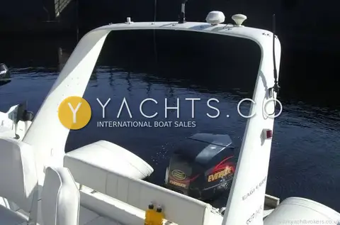 Brig 600 Eagle: view aft through the arch with domes and aerial fitted, Evinrude outboard beyond