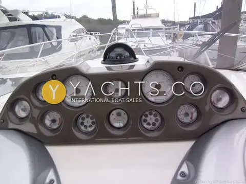 Cranchi 32 Zaffiro Reduced: instrument cluster of engine gauges and twin rev counters with compass on top