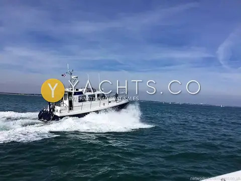 Cygnus Marine Cygnus Cyclone 26 Patrol Mk III: running at speed under blue sky, radar arch and ensign visible on wheelhouse