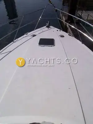 Fairline Phantom 41 Reduced: foredeck looking forward to stainless pulpit, with deck hatch and anchor roller
