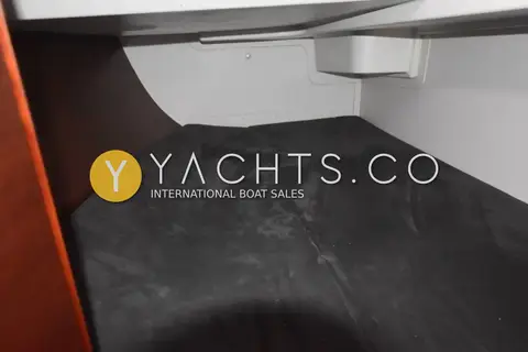 Hanse 370: aft cabin double berth with dark grey upholstery under the cockpit