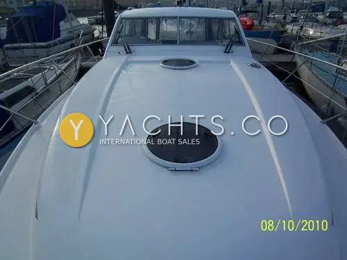 Hardy Marine Seawings 355: foredeck looking aft to the windscreen, with two round deck hatches on white moulding