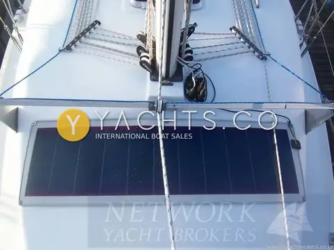 Hunter Channel 32: coachroof close-up of flexible solar panel, mast base turning blocks and rope clutches