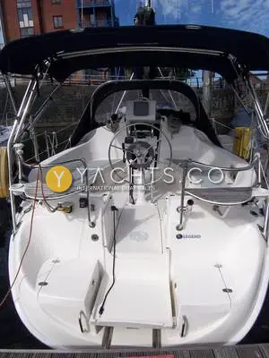 Hunter Legend 326: cockpit viewed from the stern, showing wheel, bimini and open walk-through transom