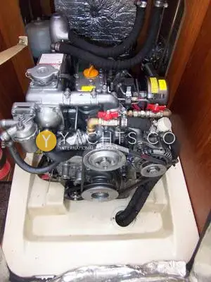 Hunter Legend 326: engine bay with the Yanmar diesel exposed beneath its removed casing