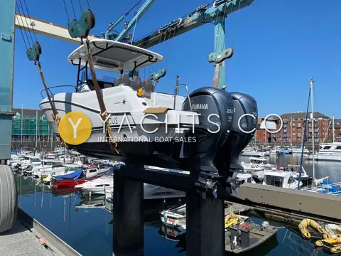Jeanneau Cap Camarat 9.0 CC: stern view in the travel hoist showing twin Yamaha 250 V6 outboards and aft seating