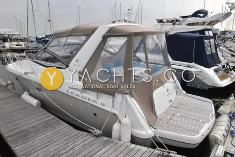 Jeanneau Leader 8: stern view showing Leader 8 lettering, full canopy and bathing platform on pontoon