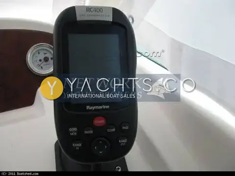 Jeanneau Merry Fisher 625 Legend: raymarine RC400 handheld GPS chartplotter mounted at the helm beside a gauge