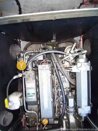 Jeanneau Merry Fisher 750 Reduced: engine bay showing the Yanmar diesel engine with soundproofing lining around it