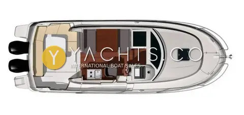 Jeanneau Merry Fisher 855: deck plan from above showing cockpit, saloon, helm and foredeck with twin outboards drawn