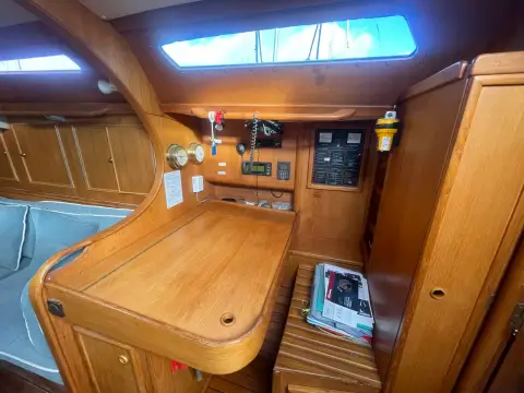 Jeanneau Olympic Sea 42 Sun Legend Hull: chart table and navigation station with instrument panel and wooden joinery
