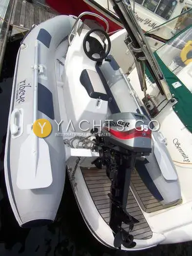 Jeanneau Prestige 36: ribeye tender with 15hp outboard stowed on the teak bathing platform