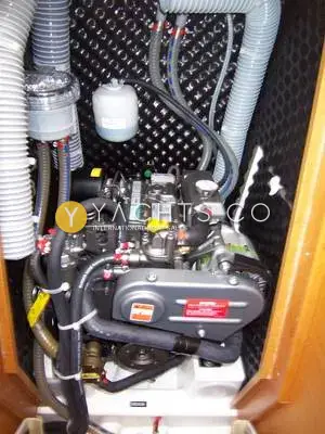 Jeanneau Sun Odyssey 30I: engine bay with compact diesel inside black soundproofing and grey hoses