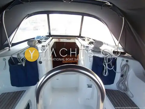 Jeanneau Sun Odyssey 37: cockpit view forward through the steering wheel to the spray hood and companionway
