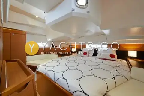 Jeanneau Sun Odyssey 41DS: aft owner's cabin with large central double berth, side seat and hull windows