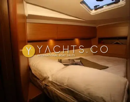 Jeanneau Sun Odyssey 50 DS- 360 Docking With: cabin double berth under an opening deck hatch, with wood lockers and reading lights