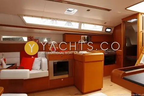 Jeanneau Sun Odyssey 509- 3 Cabins: galley and saloon seating beneath long hull windows, with built-in oven and microwave