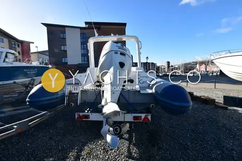 Marlin 640 FB Rib: stern view showing the outboard, A-frame and bathing platforms either side of the engine