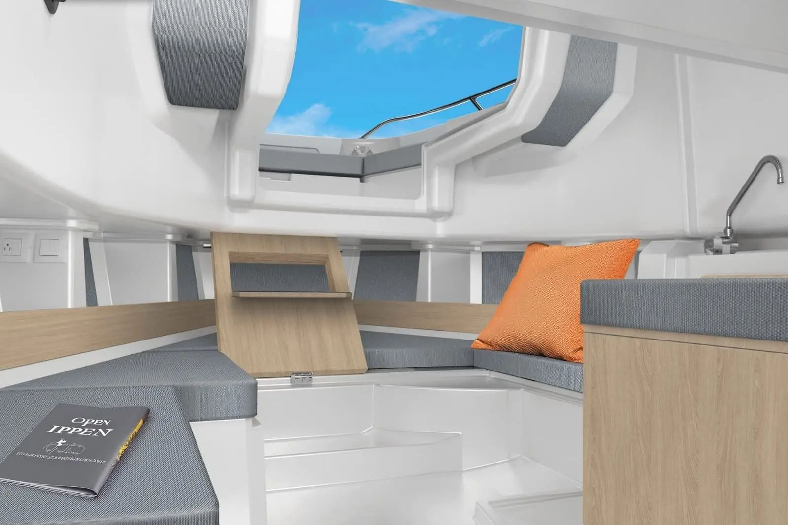 Jeanneau Cap Camarat 9.0 CC Serie 2: forward cabin with grey upholstered berth, orange cushion, open deck hatch above and small sink