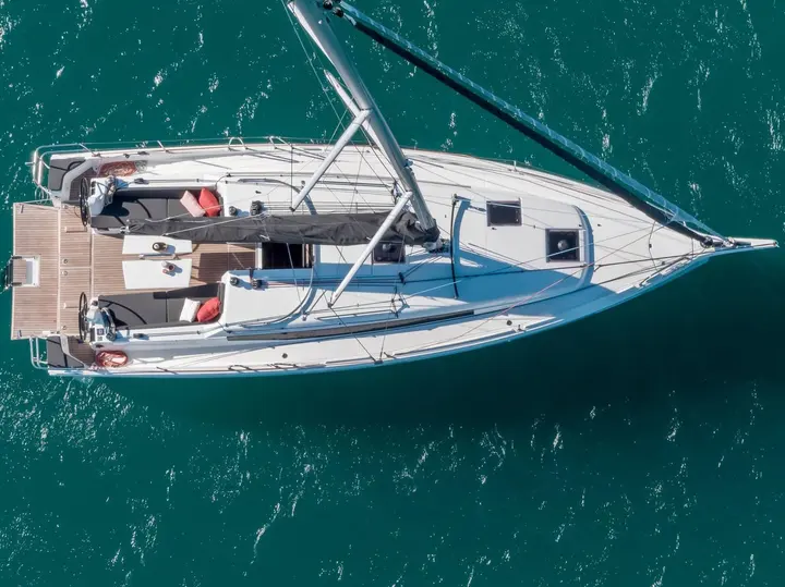 Jeanneau Sun Odyssey 380: overhead view of the deck showing twin wheels, cockpit table, teak cockpit floor and lowered stern platform