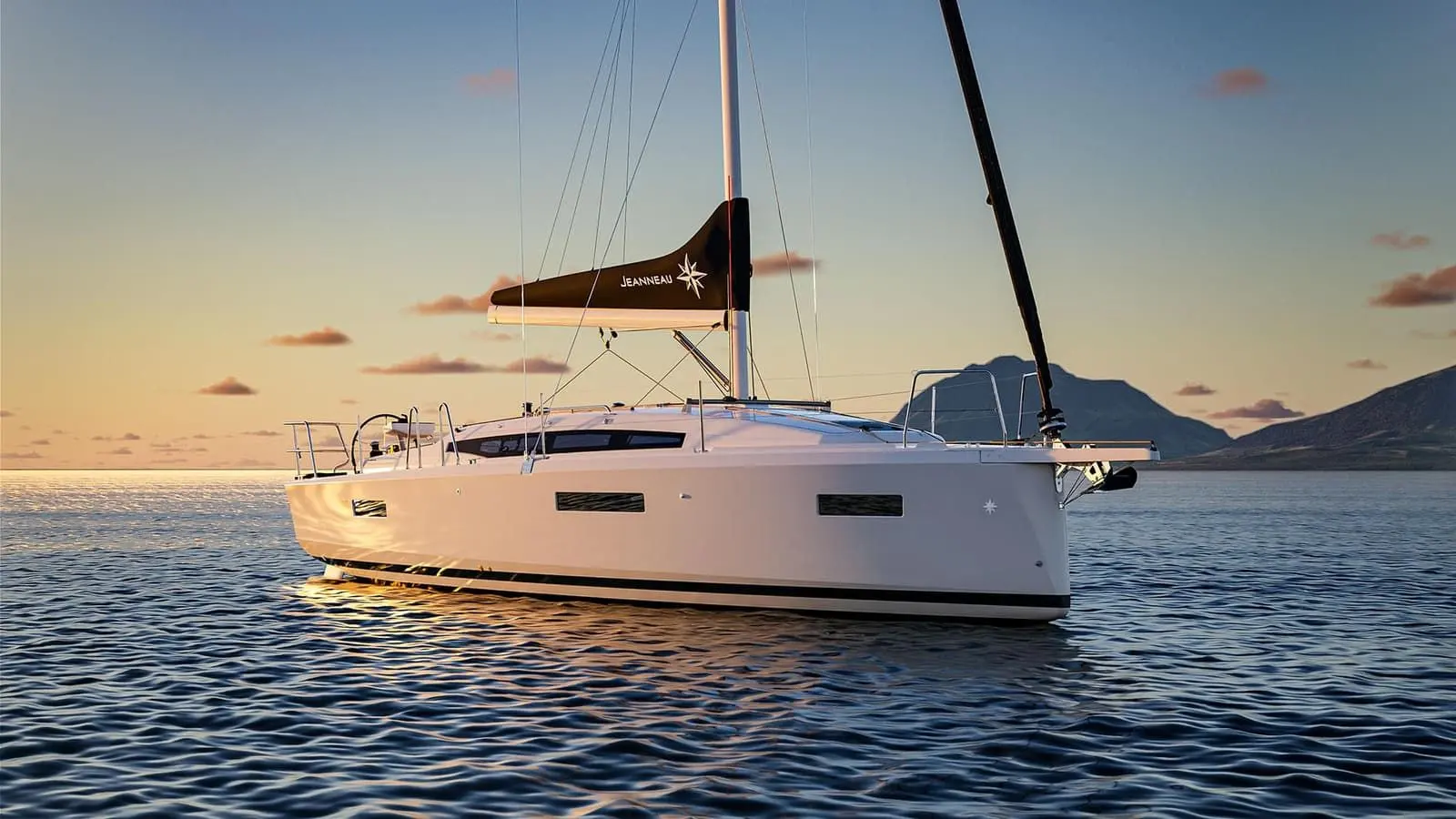 Jeanneau Sun Odyssey 385: bow three-quarter view of the white hull at anchor at sunset with mountains behind