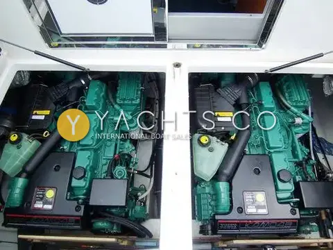 Nimbus 380 Commander: engine bay with hatches open showing twin green Volvo Penta diesels side by side
