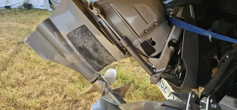 Regal LS4 Surf: close-up of the sterndrive leg and propellers while ashore on grass