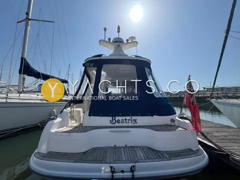 Sealine International 330 Statesman: stern view showing navy cockpit enclosure, bathing platform and radar post above