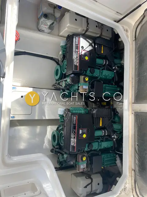 Sealine International F33: engine bay showing twin diesel engines side by side in a white compartment