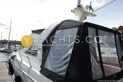 Sealine International Sealine 310/320 Statesman: black cockpit canopy with clear panels and radar arch above, viewed from the pontoon