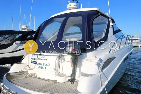 Sealine International Sealine S41: port quarter view showing teak bathing platform, navy canopy and radome above