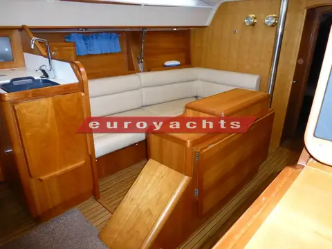 Southerly 38: saloon L-shaped cream settee to port with galley sink beside it