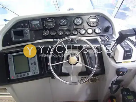 Sunseeker Martinique 36: helm with stainless wheel, gauge panel, plotter and dual throttle controls