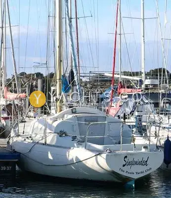 Van de Stadt Pionier 10: stern view with Singleminded and The Poole Yacht Club lettered on the transom
