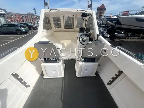 Warrior 165: self-draining cockpit looking forward to two pedestal seats and the wheelhouse
