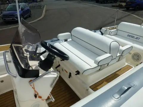 Williams DieselJet 505: helm and double helm seat with armrests seen from the starboard side