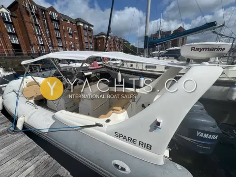 Zodiac Medline III Rib: port side with name on the tube, bimini up and twin Yamaha outboards astern